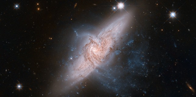 Overlapping galaxies called NGC 3314 (NASA/ESA Hubble)